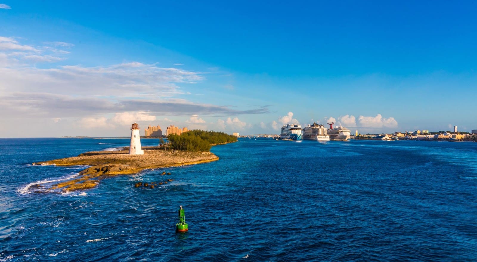 Lighthouse near Nassau with cruise ships in the distance