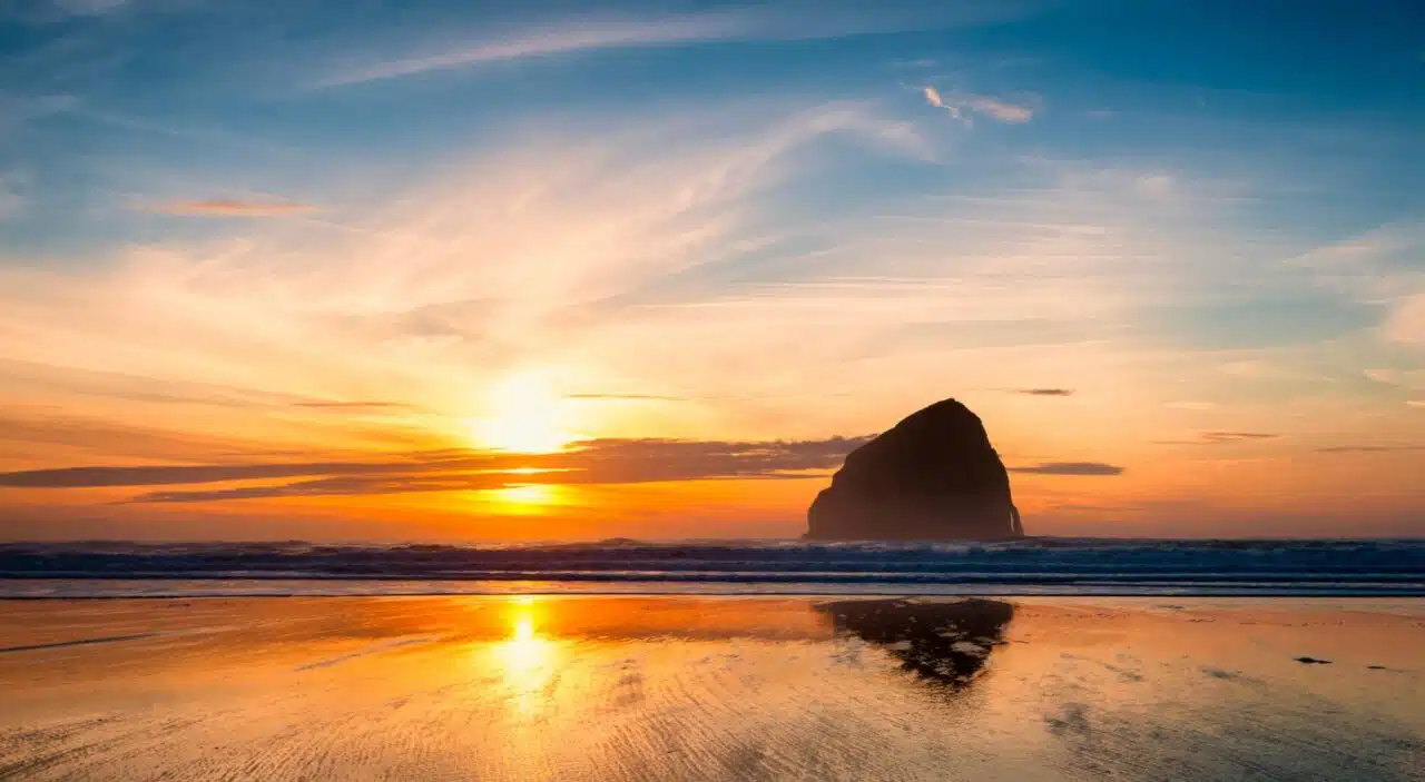 shot of cannon beach during sunset