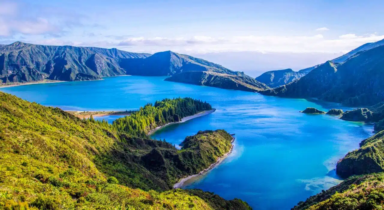 View of blue lakes, green hills, and mountains in Azores, Ponta Delgada