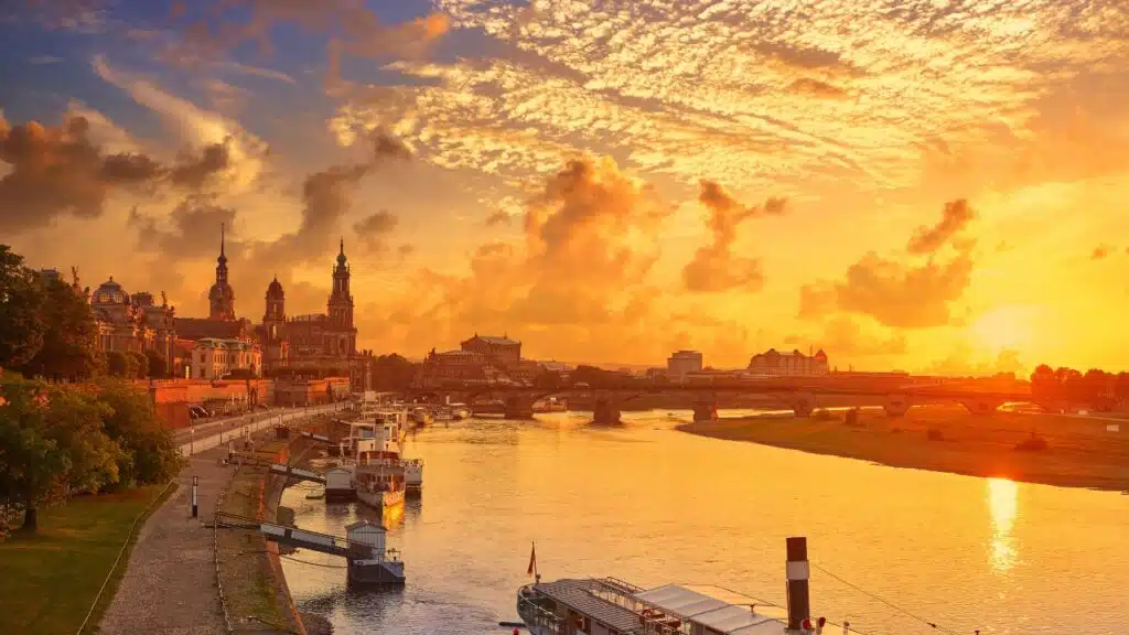 Dresden skyline reflection in Elbe River at sunset in Saxony of Germany