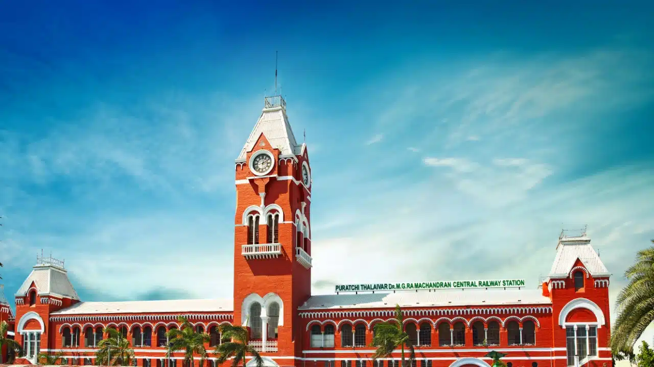 Chennai Central Railway Station in Chennai, India, featuring its iconic red-brick Gothic Revival architecture and historic clock tower.