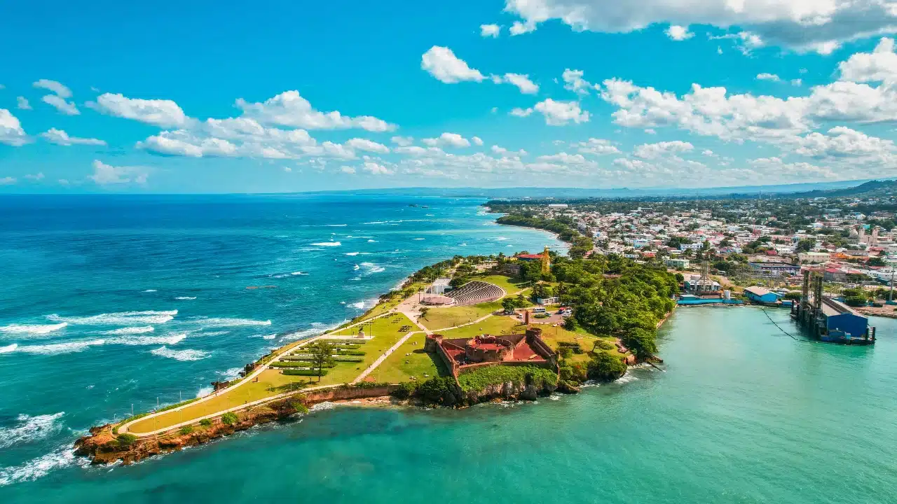 Aerial view of foreland on sea shore with the town of Puerto Plata in the background